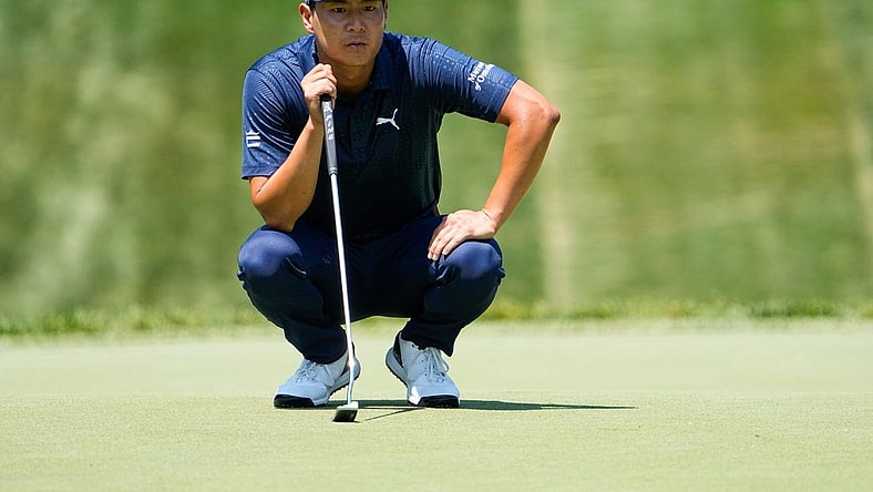 June 2, 2023; Dublin, Ohio, USA;  Justin Suh lines up a putt on the eighth green during the second round of the Memorial Tournament at Muirfield Village Golf Club.