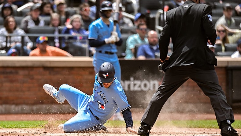 Jun 4, 2023; New York City, New York, USA; Toronto Blue Jays left fielder Daulton Varsho (25) scores on a two RBI double by Toronto Blue Jays second baseman Whit Merrifield (not pictured) during the second inning against the New York Mets at Citi Field. Mandatory Credit: John Jones-USA TODAY Sports