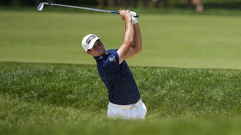 Jun 4, 2023; Dublin, Ohio, USA; Viktor Hovland hits from a bunker on the first fairway during the final round of the Memorial Tournament golf tournament at the Muirfield Village Golf Club. Mandatory Credit: Aaron Doster-USA TODAY Sports