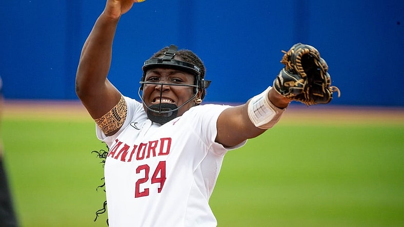 Stanford starting pitcher NiJaree Canady (24) pitches during a softball game between Stanford and Washington at the Women's College World Series at USA Softball Hall of Fame Stadium in in Oklahoma City on Sunday, June 4, 2023.
