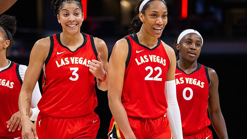Jun 4, 2023; Indianapolis, Indiana, USA; Las Vegas Aces forward Candace Parker (3) and forward A'ja Wilson (22) celebrates the win against the Indiana Fever  at Gainbridge Fieldhouse. Mandatory Credit: Trevor Ruszkowski-USA TODAY Sports
