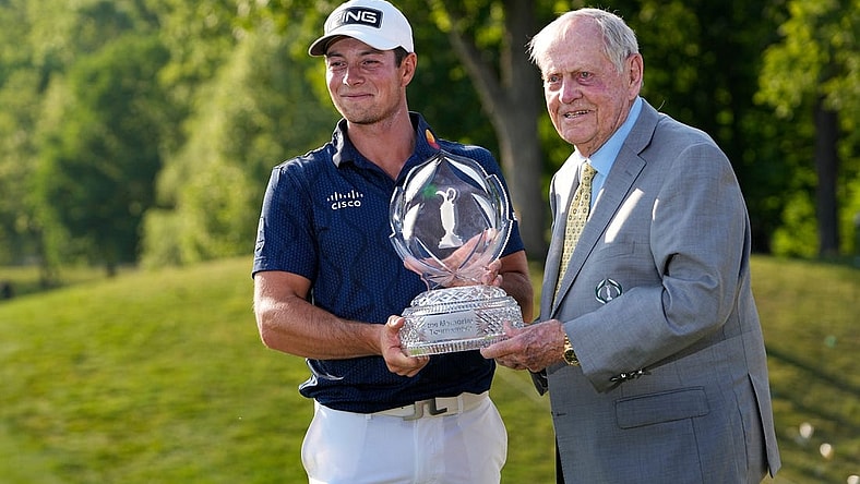 June 4, 2023; Dublin, Ohio, USA;  Viktor Hovland stands with Jack Nicklaus and the trophy after winning in a playoff over Denny McCarthy during the final round of the Memorial Tournament at Muirfield Village Golf Club.