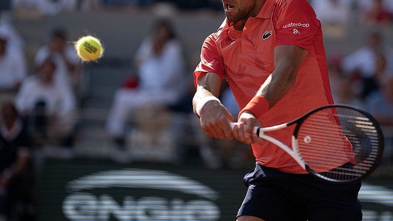Jun 6 2023; Paris,France; Novak Djokovic (SRB) returns a shot during his match against Karen Khachanov on day 10 at Stade Roland-Garros. Mandatory Credit: Susan Mullane-USA TODAY Sports
