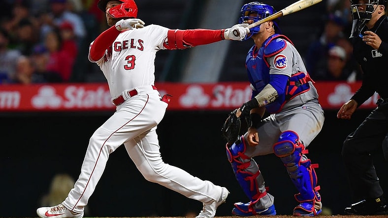 Jun 6, 2023; Anaheim, California, USA; Los Angeles Angels left fielder Taylor Ward (3) hits a solo home run against the Chicago Cubs during the seventh inning at Angel Stadium. Mandatory Credit: Gary A. Vasquez-USA TODAY Sports