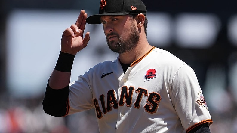 May 29, 2023; San Francisco, California, USA; San Francisco Giants third baseman J.D. Davis (7) gestures before the game against the Pittsburgh Pirates at Oracle Park. Mandatory Credit: Darren Yamashita-USA TODAY Sports