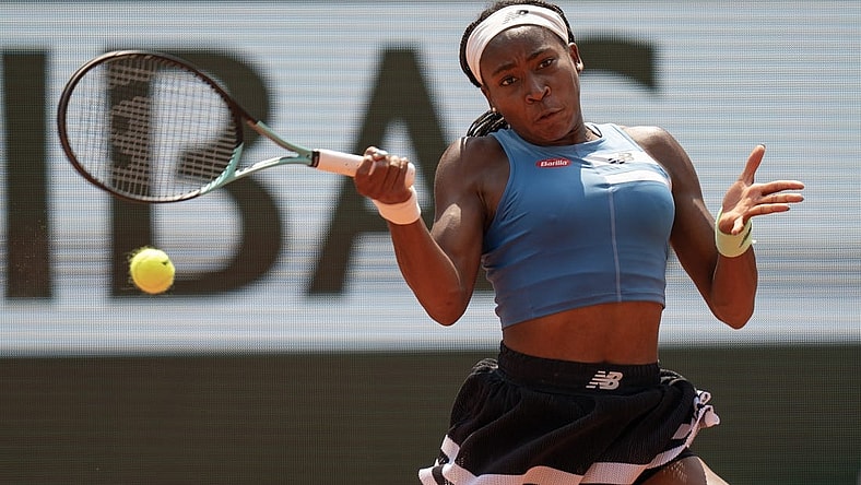 Jun 7 2023; Paris,France; Coco Gauff (USA) returns a shot during her match against Iga Swiatek (POL) on day 11 at Stade Roland-Garros. Mandatory Credit: Susan Mullane-USA TODAY Sports