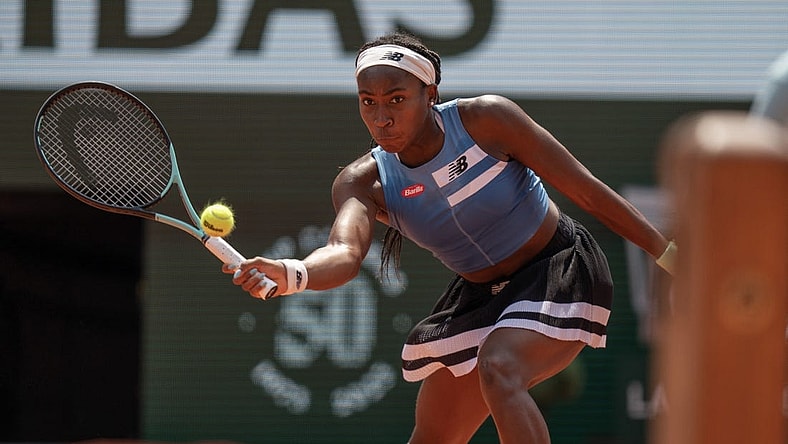 Jun 7 2023; Paris,France; Coco Gauff (USA) returns a shot during her match against Iga Swiatek (POL) on day 11 at Stade Roland-Garros. Mandatory Credit: Susan Mullane-USA TODAY Sports