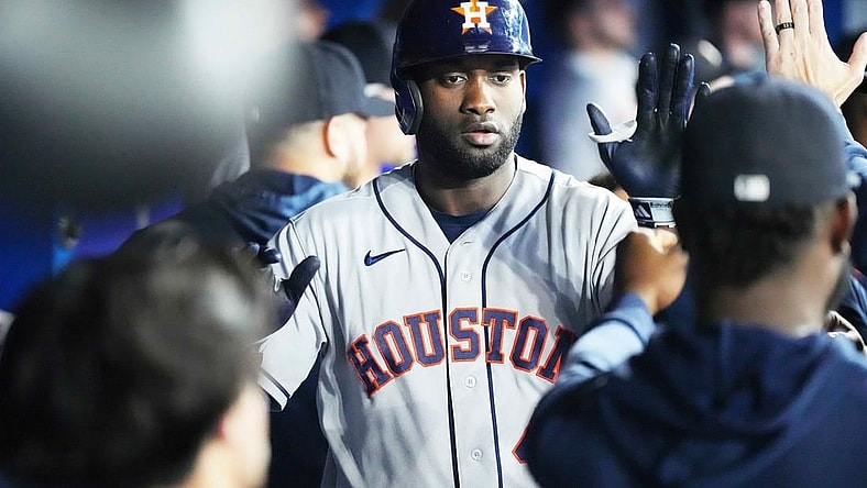 Jun 7, 2023; Toronto, Ontario, CAN; Houston Astros designated hitter Yordan Alvarez (44) celebrates in the dugout after hitting a two run home run against the Toronto Blue Jays during the fourth inning at Rogers Centre. Mandatory Credit: Nick Turchiaro-USA TODAY Sports
