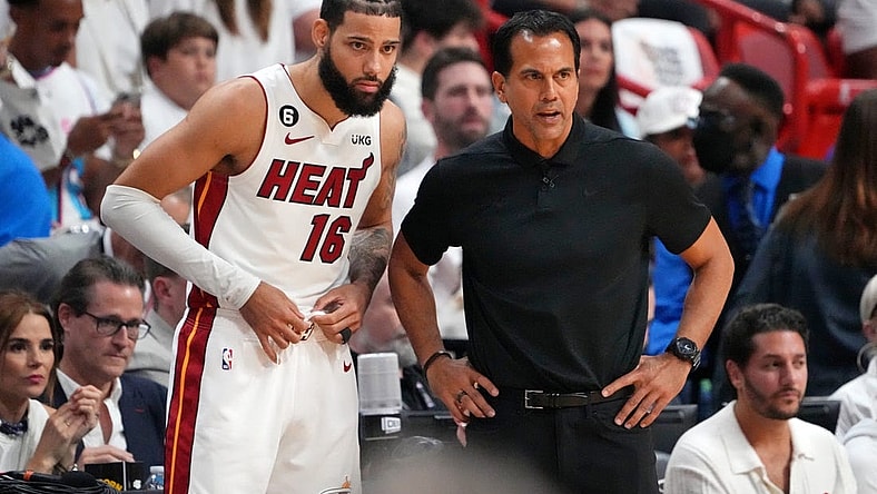 Jun 9, 2023; Miami, Florida, USA; Miami Heat forward Caleb Martin (16) talks with head coach Erik Spoelstra during a pause in play against the Denver Nuggets during the first quarter in game four of the 2023 NBA Finals at Kaseya Center. Mandatory Credit: Kyle Terada-USA TODAY Sports