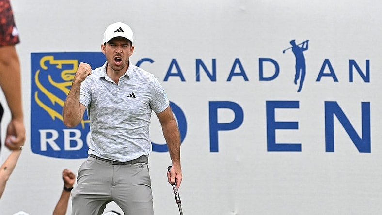Jun 11, 2023; Toronto, ON, CAN;  Nick Taylor reacts after sinking a birdie putt on the 18th green to take the tournament lead during the final round of the RBC Canadian Open golf tournament. Mandatory Credit: Dan Hamilton-USA TODAY Sports