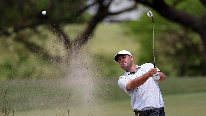 Jun 12, 2023; Los Angeles, California, USA; Scottie Scheffler hits out of a bunker on the 16th green during a practice round of the U.S. Open golf tournament. Mandatory Credit: Kiyoshi Mio-USA TODAY Sports