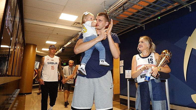 Jun 12, 2023; Denver, Colorado, USA; Denver Nuggets center Nikola Jokic (15) celebrates with his family after the Nuggets won the NBA championship by defeating the Miami Heat in game five of the 2023 NBA Finals at Ball Arena. Mandatory Credit: Isaiah J. Downing-USA TODAY Sports
