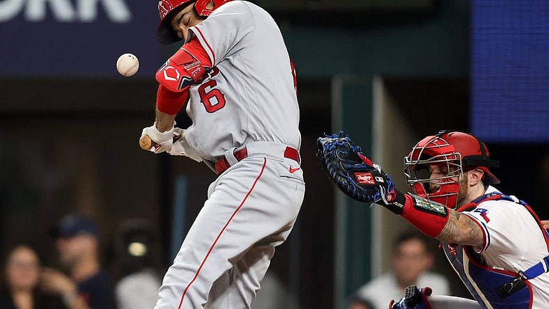 Jun 15, 2023; Arlington, Texas, USA; Los Angeles Angels third baseman Anthony Rendon (6) is hit by a pitch in the first inning against the Texas Rangers at Globe Life Field. Mandatory Credit: Tim Heitman-USA TODAY Sports