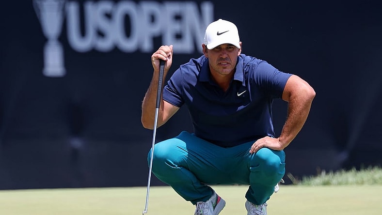 Jun 16, 2023; Los Angeles, California, USA; Brooks Koepka (LIV player) lines up a putt on the on the ninth green during the second round of the U.S. Open golf tournament. Mandatory Credit: Kiyoshi Mio-USA TODAY Sports