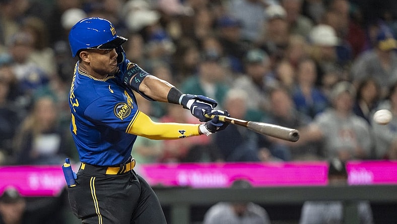 Jun 16, 2023; Seattle, Washington, USA; Seattle Mariners centerfielder Julio Rodriguez (44) hits a double off Chicago White Sox starting pitcher Michael Kopech (34) during the fifth inning at T-Mobile Park. Mandatory Credit: Stephen Brashear-USA TODAY Sports