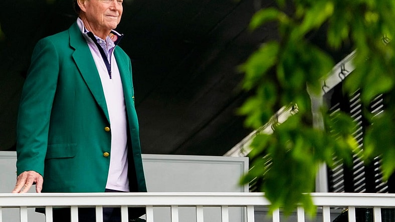 Tom Watson looks out from the clubhouse balcony during the first round of the 2023 Masters golf tournament.