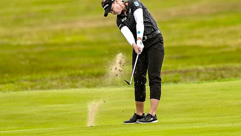 Jun 22, 2023; Springfield, New Jersey, USA; Brooke Mackenzie Henderson plays a shot from the fairway on the 18th hole during the first round of the KPMG Women's PGA Championship golf tournament. Mandatory Credit: John Jones-USA TODAY Sports