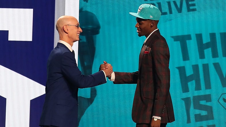 Jun 22, 2023; Brooklyn, NY, USA; Brandon Miller (Alabama) is greeted by NBA commissioner Adam Silver after being selected second by the Charlotte Hornets in the first round of the 2023 NBA Draft at Barclays Arena. Mandatory Credit: Wendell Cruz-USA TODAY Sports