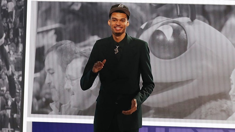 Jun 22, 2023; Brooklyn, NY, USA; Victor Wembanyama reacts after being selected first by the San Antonio Spurs in the first round of the 2023 NBA Draft at Barclays Arena. Mandatory Credit: Wendell Cruz-USA TODAY Sports