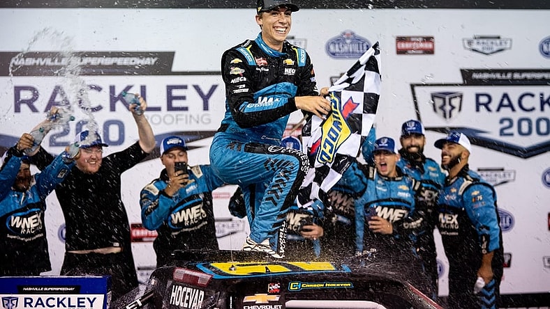 NASCAR Craftsman Truck Series driver Carson Hocevar celebrates winning the Rackley Roofing 200 Race at Nashville Superspeedway in Lebanon, Tenn., Friday, June 23, 2023.
