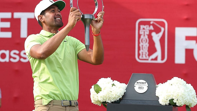 Tony Finau celebrates winning the Rocket Mortgage Classic at the Detroit Golf Club, Sunday, July 31, 2022.