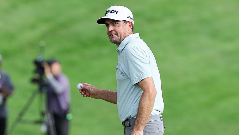 Jun 24, 2023; Cromwell, Connecticut, USA; Keegan Bradley gestures to fans after finishing his round on the 18th green during the third round of the Travelers Championship golf tournament. Mandatory Credit: Vincent Carchietta-USA TODAY Sports