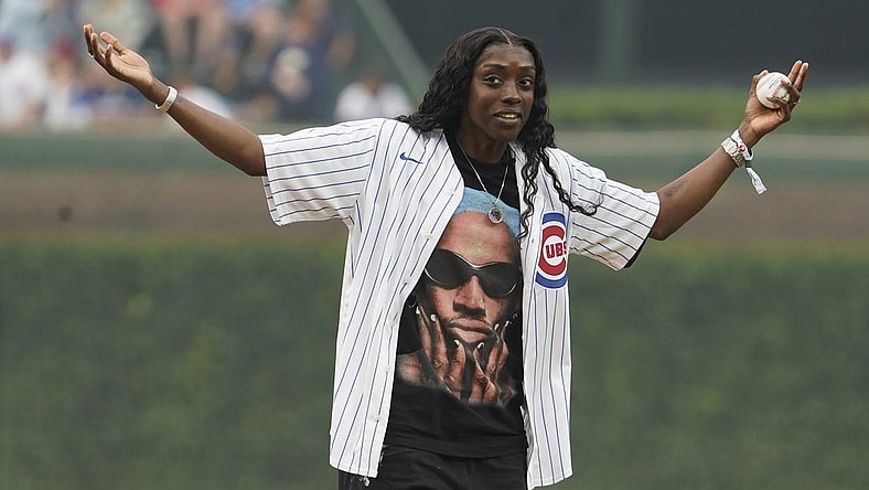 Jun 27, 2023; Chicago, Illinois, USA; Chicago Sky s WNBA player Kahleah Copper throws a ceremonial first pitch before the game between the Chicago Cubs and the Philadelphia Phillies at Wrigley Field. Mandatory Credit: David Banks-USA TODAY Sports