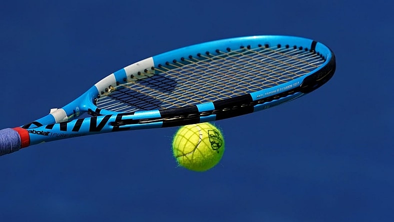 Aug 15, 2019; Mason, OH, USA; A view of the Western and Southern Open tennis ball on the racquet of Rebecca Peterson (SWE) as she prepares to serve against Karolina Pliskova (CZE) during the Western and Southern Open tennis tournament at Lindner Family Tennis Center. Mandatory Credit: Aaron Doster-USA TODAY Sports