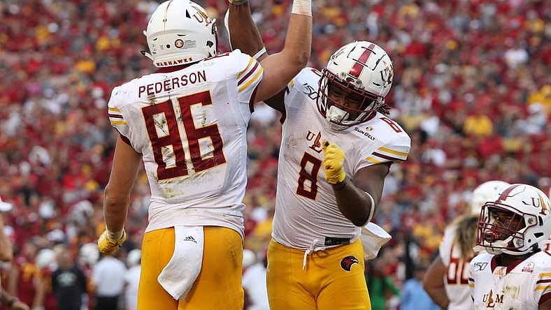 Sep 21, 2019; Ames, IA, USA; Louisiana Monroe Warhawks tight end Josh Pederson (86) and Louisiana Monroe Warhawks running back Josh Johnson (8) celebrate after a touchdown against the Iowa State Cyclones at Jack Trice Stadium. Mandatory Credit: Reese Strickland-USA TODAY Sports