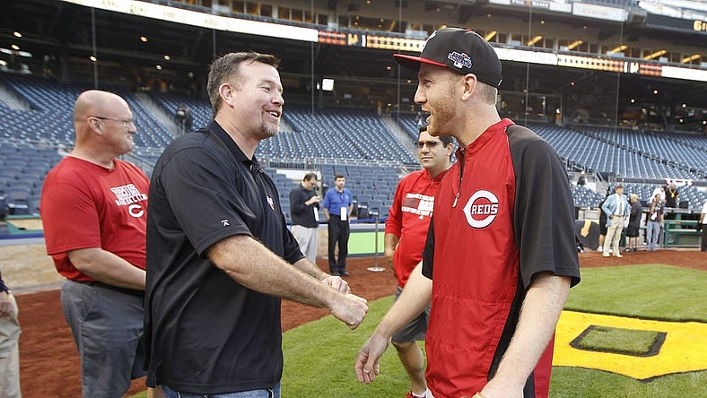 OCTOBER 1, 2013: Former Red Sean Casey and Reds third baseman Todd Frazier talk prior to a MLB Wild Card Playoff game against the Pittsburgh Pirates at PNC Park.

Reds