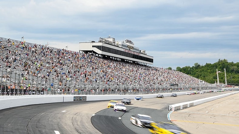 Aug 2, 2020; Loudon, New Hampshire, USA; NASCAR Cup Series driver Brad Keselowski (2) leads the field into turn one at the New Hampshire Motor Speedway. Mandatory Credit: Brian Fluharty-USA TODAY Sports