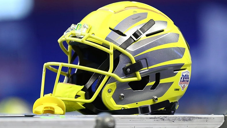 Jan 2, 2021; Glendale, AZ, USA; Detailed view of an Oregon Ducks helmet during the Fiesta Bowl at State Farm Stadium. Mandatory Credit: Mark J. Rebilas-USA TODAY Sports