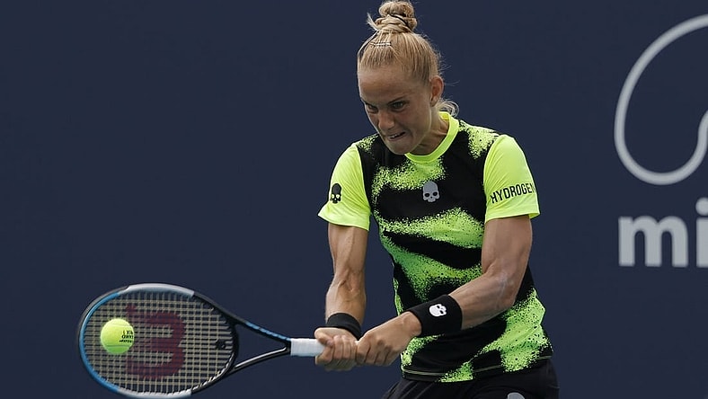 Mar 22, 2022; Miami Gardens, FL, USA; Arantxa Rus of Netherlands hits a backhand against Heather Watson of Great Britain (not pictured) in a first round women's singles match in the Miami Open at Hard Rock Stadium. Mandatory Credit: Geoff Burke-USA TODAY Sports