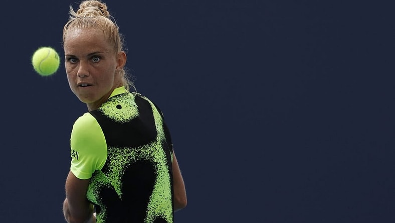Mar 22, 2022; Miami Gardens, FL, USA; Arantxa Rus of Netherlands hits a backhand against Heather Watson of Great Britain (not pictured) in a first round women's singles match in the Miami Open at Hard Rock Stadium. Mandatory Credit: Geoff Burke-USA TODAY Sports