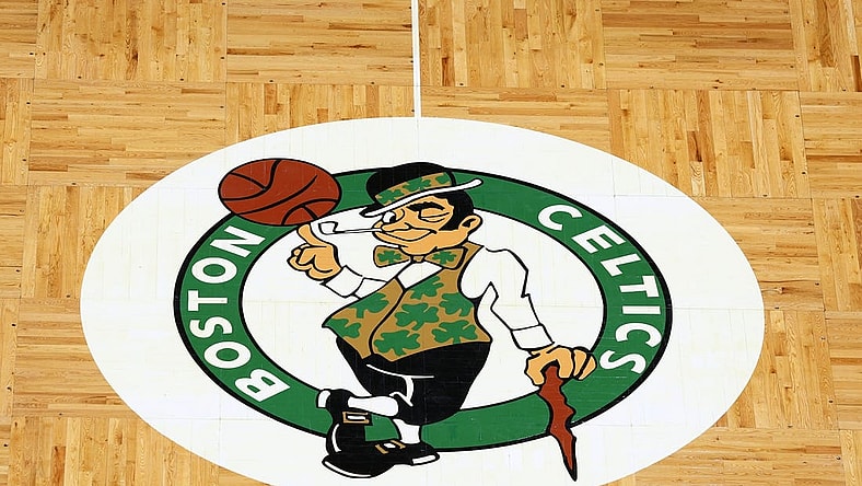 Apr 3, 2022; Boston, Massachusetts, USA; The Boston Celtics logo is seen on the parquet floor at center court before the game between the Boston Celtics and the Washington Wizards at TD Garden. Mandatory Credit: Winslow Townson-USA TODAY Sports