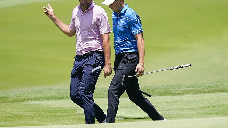 Scottie Scheffler and Jordan Spieth walk to the 9th green during the second round of the AT&T Byron Nelson golf tournament. Mandatory Credit: Raymond Carlin III-USA TODAY Sports