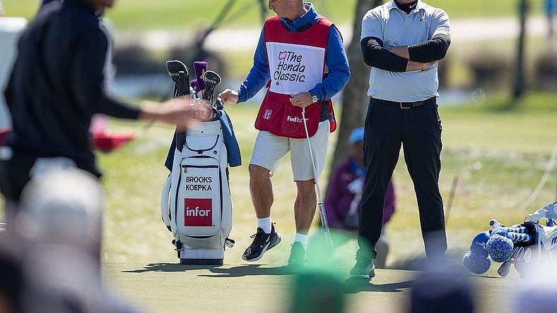 Brooks Koepka watches Matthew Wolff putt on the 4th hole during the second round of the Honda Classic at PGA National in Palm Beach Gardens, Feb. 28, 2020.

Brooks Koepka 22