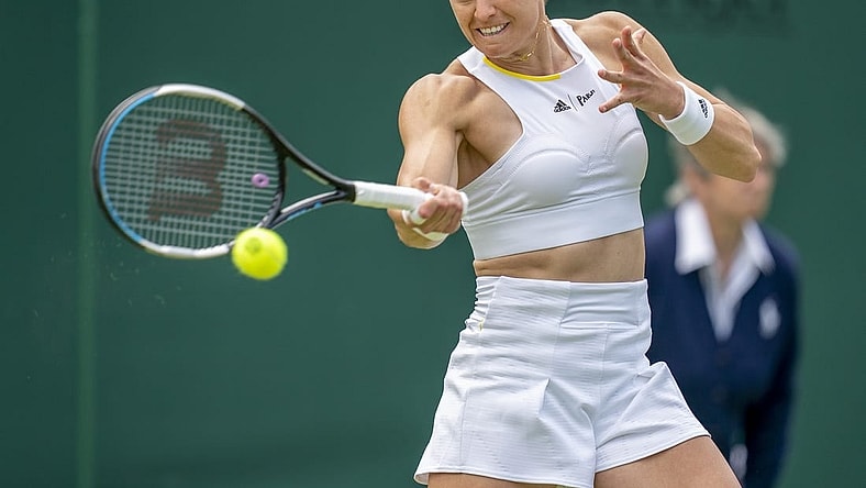Jun 28, 2022; London, United Kingdom; Maria Sakkari (GRE) returns a shot during her first round match against Zoe Hives (AUS) on day two at All England Lawn Tennis and Croquet Club. Mandatory Credit: Susan Mullane-USA TODAY Sports