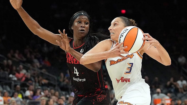 Jun 29, 2022; Phoenix, Arizona, USA; Phoenix Mercury guard Diana Taurasi (3) drives against Indiana Fever center Queen Egbo (4) during the first half at Footprint Center. Mandatory Credit: Joe Camporeale-USA TODAY Sports
