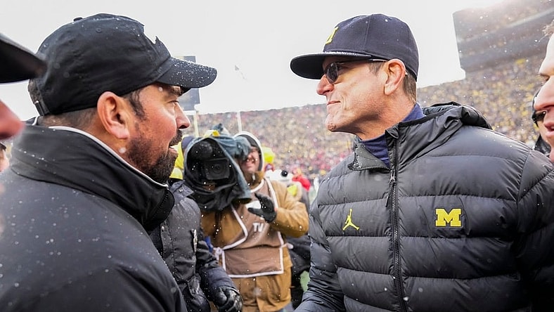 Ohio State coach Ryan Day shakes hands with Michigan coach Jim Harbaugh following Saturday's game.

Img Ohio State Buckeyes 1 1 0euspm7b L1741352332