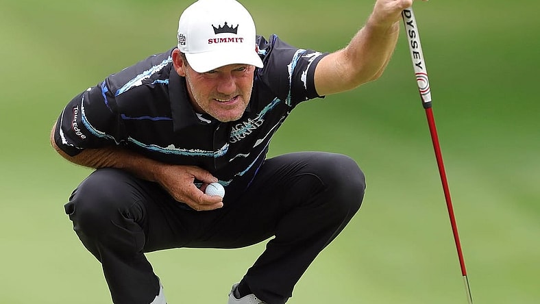 Alex Cejka reads the green on the 1st hole during second round of the Bridgestone Senior Players Tournament at Firestone Country Club on Friday.

Bridgestonejl 2