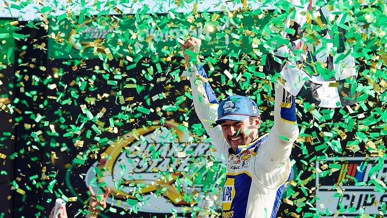 Jul 10, 2022; Hampton, Georgia, USA; NASCAR Cup Series driver Chase Elliott (9) celebrates in Victory Lane winning the Quaker State 400 at Atlanta Motor Speedway. Mandatory Credit: John David Mercer-USA TODAY Sports