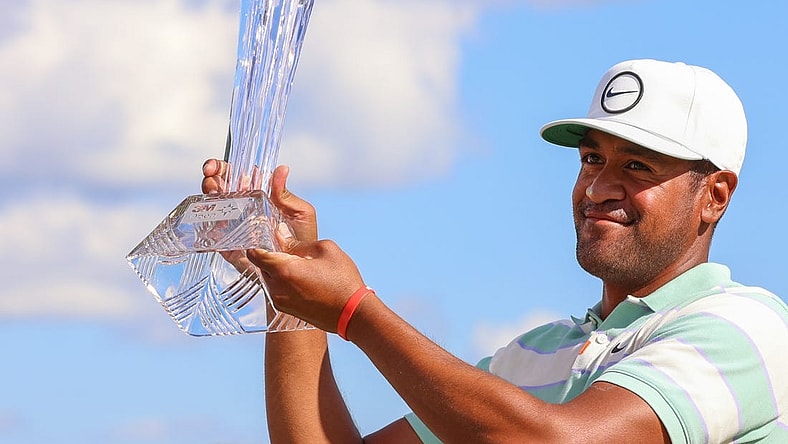 Jul 24, 2022; Blaine, Minnesota, USA; Tony Finau poses with the trophy after winning the 3M Open golf tournament. Mandatory Credit: Matt Krohn-USA TODAY Sports