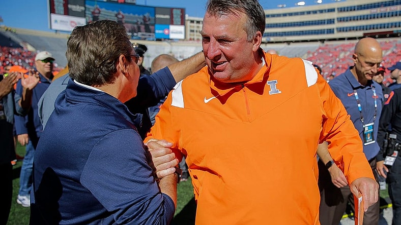 Illinois head coach Bret Bielema celebrates with a supporter as he heads to the locker room after a game against Wisconsin on Saturday, October 1, 2022, at Camp Randall Stadium in Madison, Wis. Illinois won the game, 34-10, in Bielema   s return to Madison after coaching the Badgers from 2006-2012.Tork Mason/USA TODAY NETWORK-Wisconsin

Usat Wisconsin Vs Illinois Football 100122 2932 Ttm