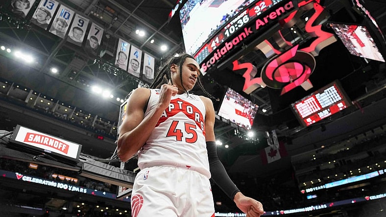 Oct 9, 2022; Toronto, Ontario, CAN; Toronto Raptors guard Dalano Banton (45) celebrates after scoring against the Chicago Bulls at Scotiabank Arena. Mandatory Credit: Kevin Sousa-USA TODAY Sports