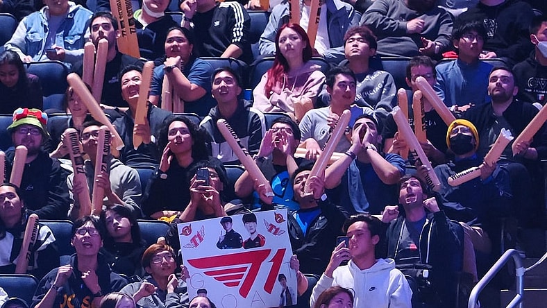 Nov 5, 2022; San Francisco, California, USA;  A fan holds a sign for T1 during the League of Legends World Championships against DRX at Chase Center. Mandatory Credit: Kelley L Cox-USA TODAY Sports
