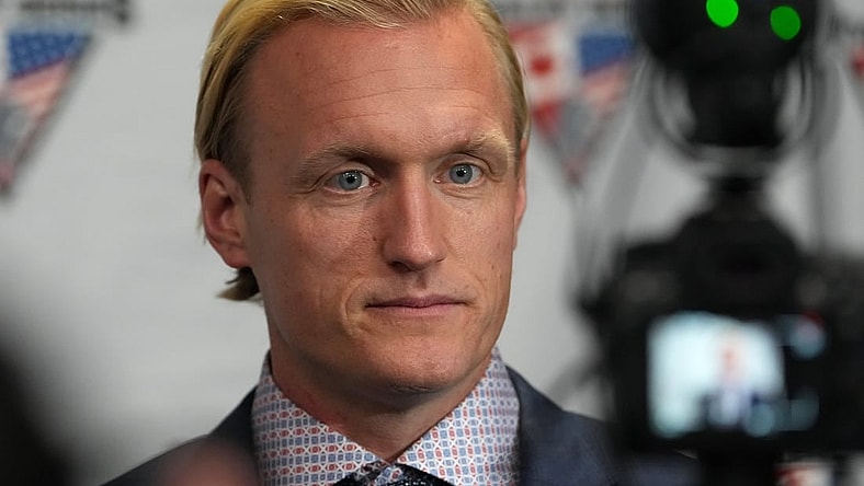 Dec 15, 2022; Henderson, Nevada, USA; Team USA head coach John Wroblewski takes questions from reporters after Team Canada defeated Team USA 3-2 in a Rivalry Series women's ice hockey game at Dollar Loan Center. Mandatory Credit: Stephen R. Sylvanie-USA TODAY Sports