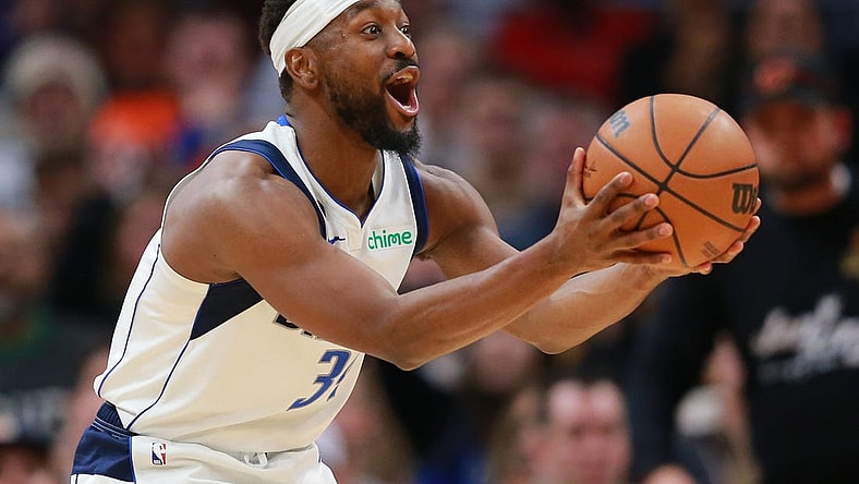 Dec 17, 2022; Cleveland, Ohio, USA; Dallas Mavericks guard Kemba Walker (34) reacts after a foul call during the second half against the Cleveland Cavaliers at Rocket Mortgage FieldHouse. Mandatory Credit: Aaron Josefczyk-USA TODAY Sports