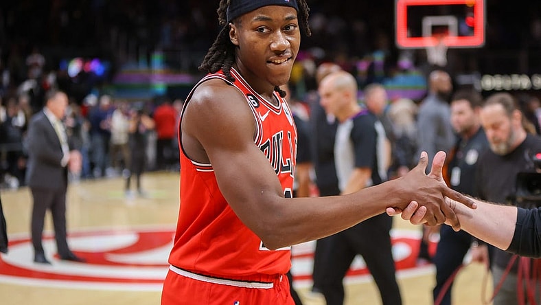Dec 21, 2022; Atlanta, Georgia, USA; Chicago Bulls guard Ayo Dosunmu (12) celebrates after a game-winning basket against the Atlanta Hawks at State Farm Arena. Mandatory Credit: Brett Davis-USA TODAY Sports