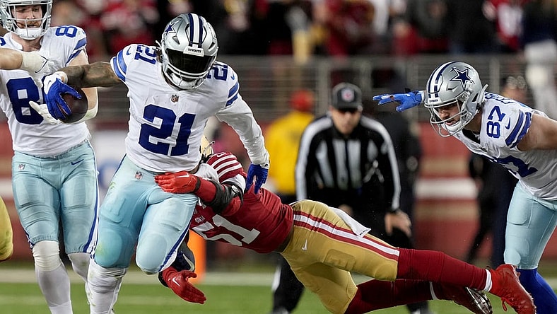 Jan 22, 2023; Santa Clara, California, USA; Dallas Cowboys running back Ezekiel Elliott (21) runs past San Francisco 49ers linebacker Azeez Al-Shaair (51) during the fourth quarter of a NFC divisional round game at Levi's Stadium. Mandatory Credit: Kyle Terada-USA TODAY Sports